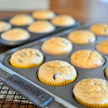a muffin pan full of just baked muffins