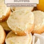 Four Lemon Lime Muffins, perfectly glazed, are stacked on a white cloth with a fresh lemon in the background.