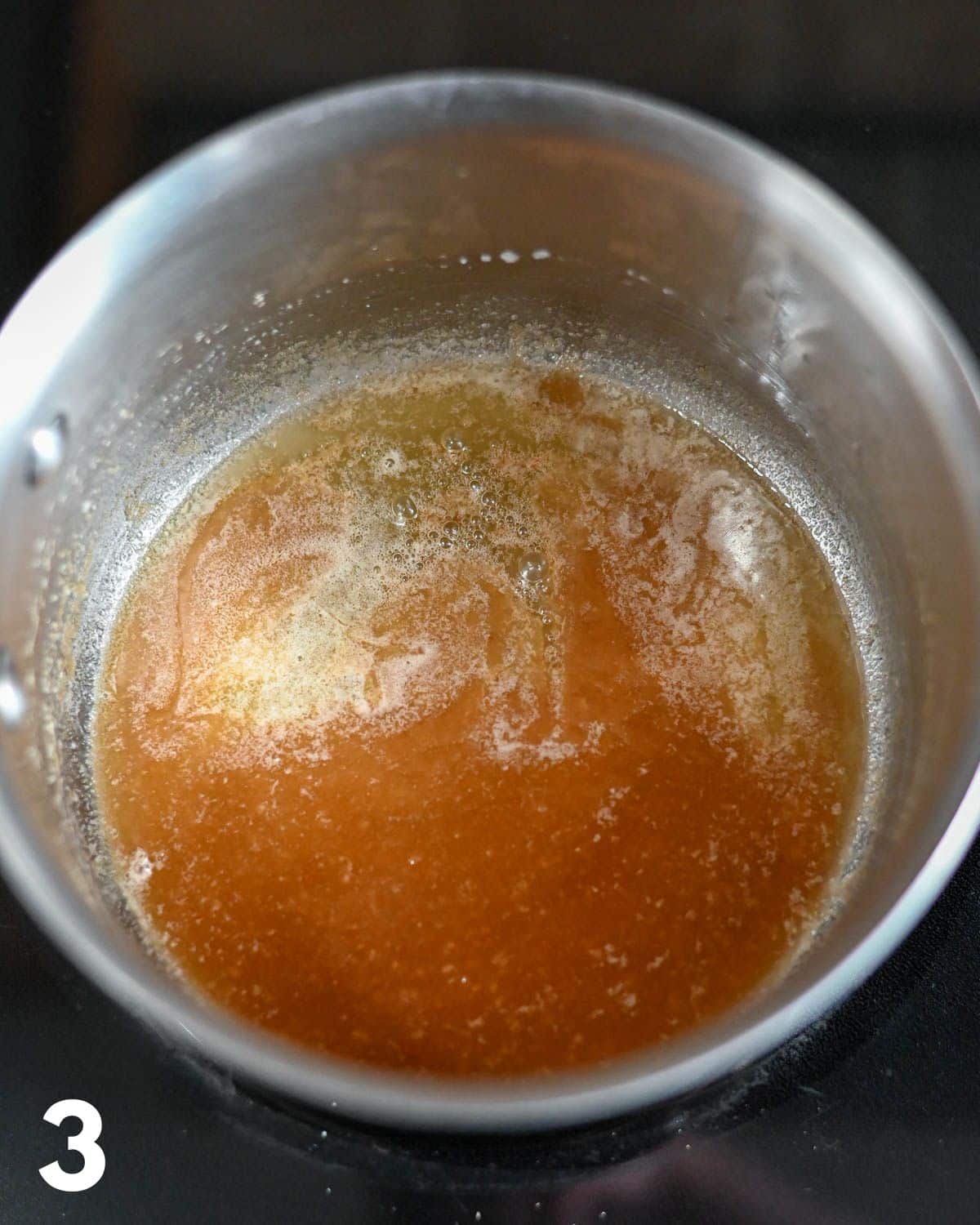Melted butter and brown sugar cooking in a sauce pan. 