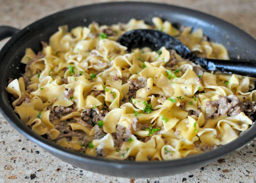 hamburger stroganoff  in a black skillet