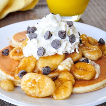 closeup of brown sugared bananas topped pancakes