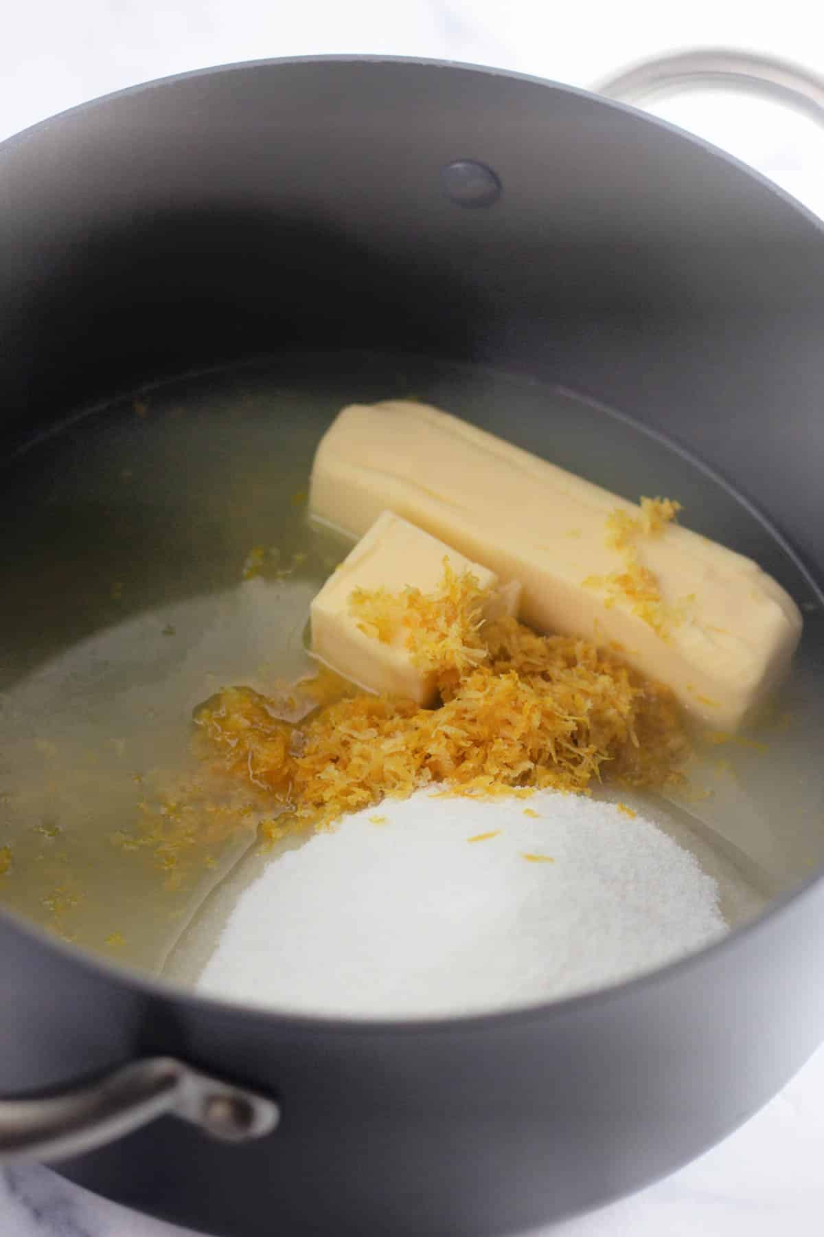 Lemon juice, butter, lemon zest, sugar and salt in a large pan.