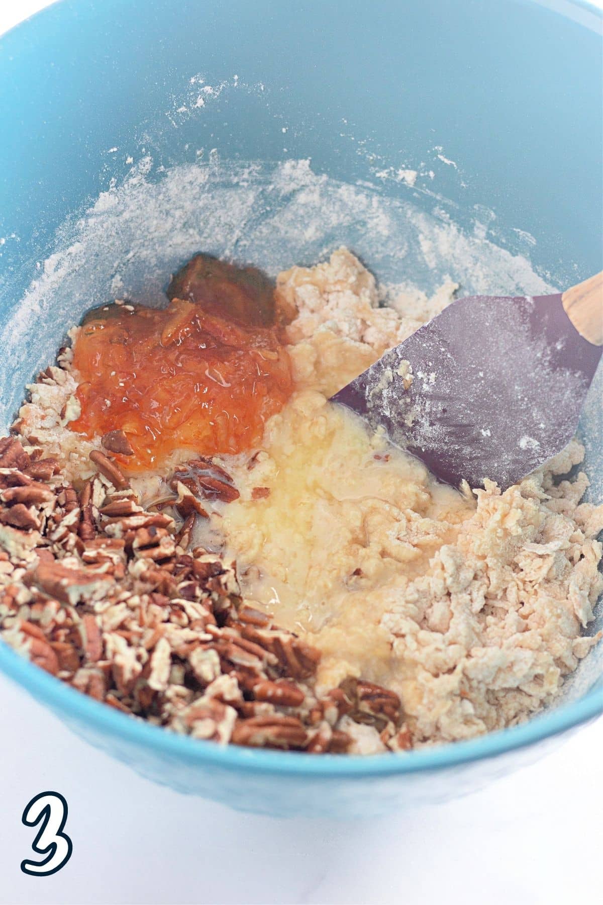 Orange marmalade and chopped pecans added to orange bread batter. 