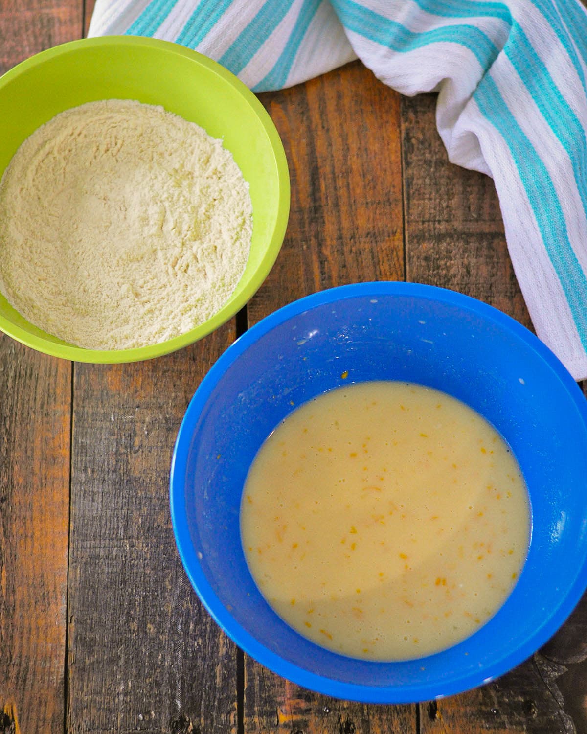 Dry ingredients in one bowl and wet ingredients in another for quick bread.