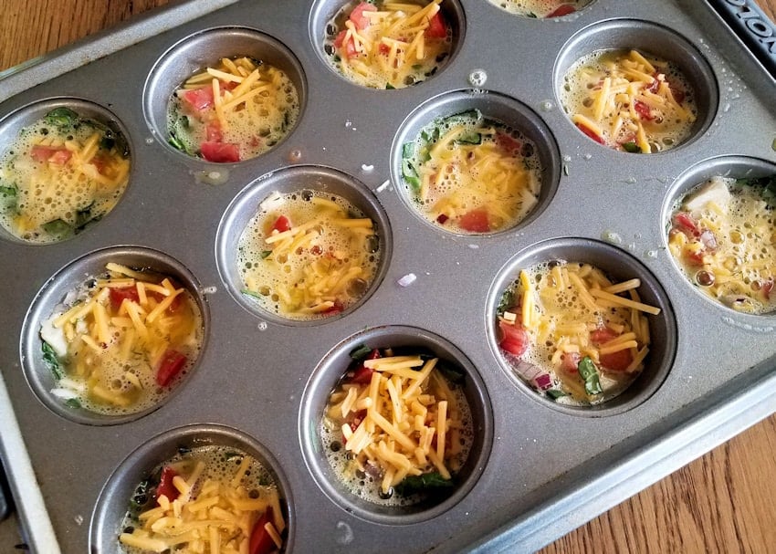 Spinach Egg Cups ingredients in a muffin tin