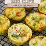 Spinach Egg Cups with cottage cheese and vegetables cool on a wire rack, ready to serve—a healthy twist on classic egg cups.