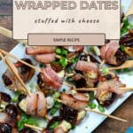 Enjoy this delicious appetizer: Cheese Stuffed Dates Wrapped in Bacon, garnished with fresh green onions and served with toothpicks for easy sharing.