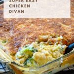 Close up photo of a scoop of chicken divan being removed from a 13 x 9 baking dish