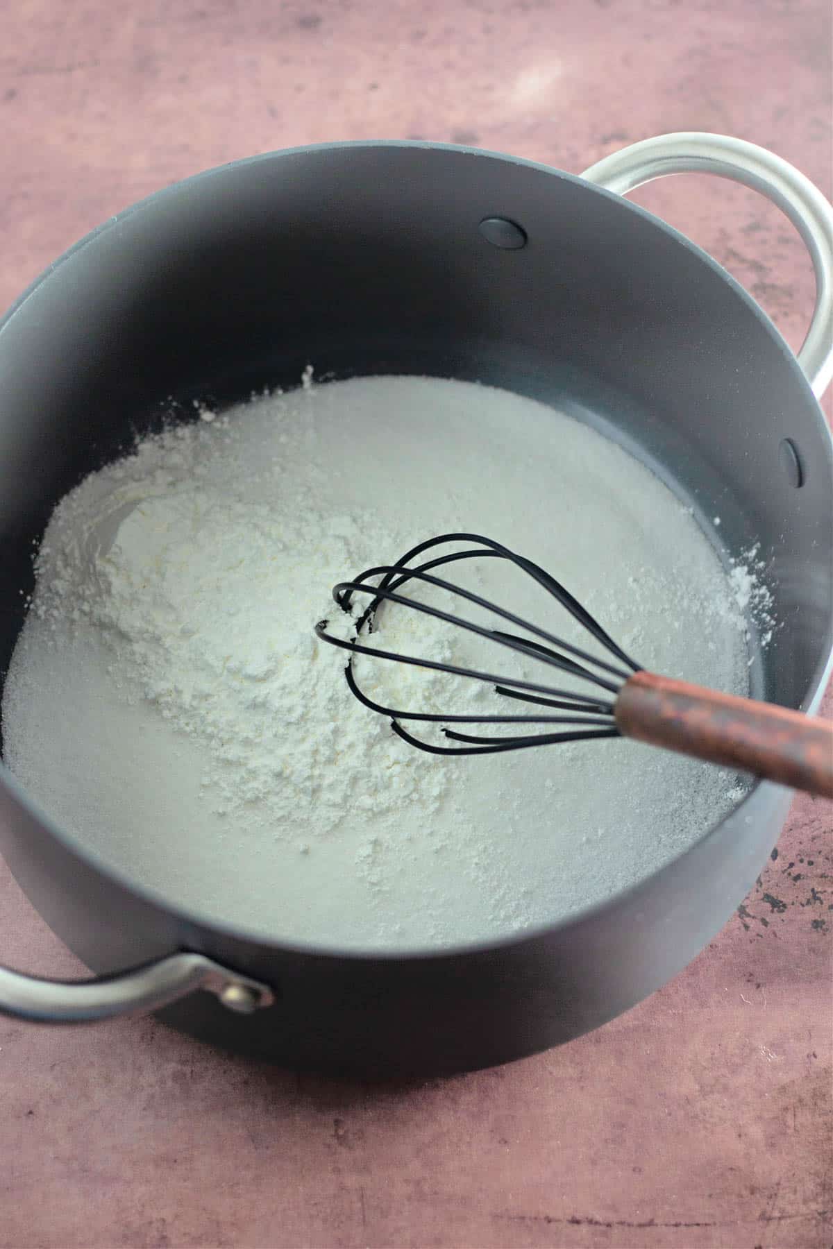 Sugar and cornstarch in a saucepan. 