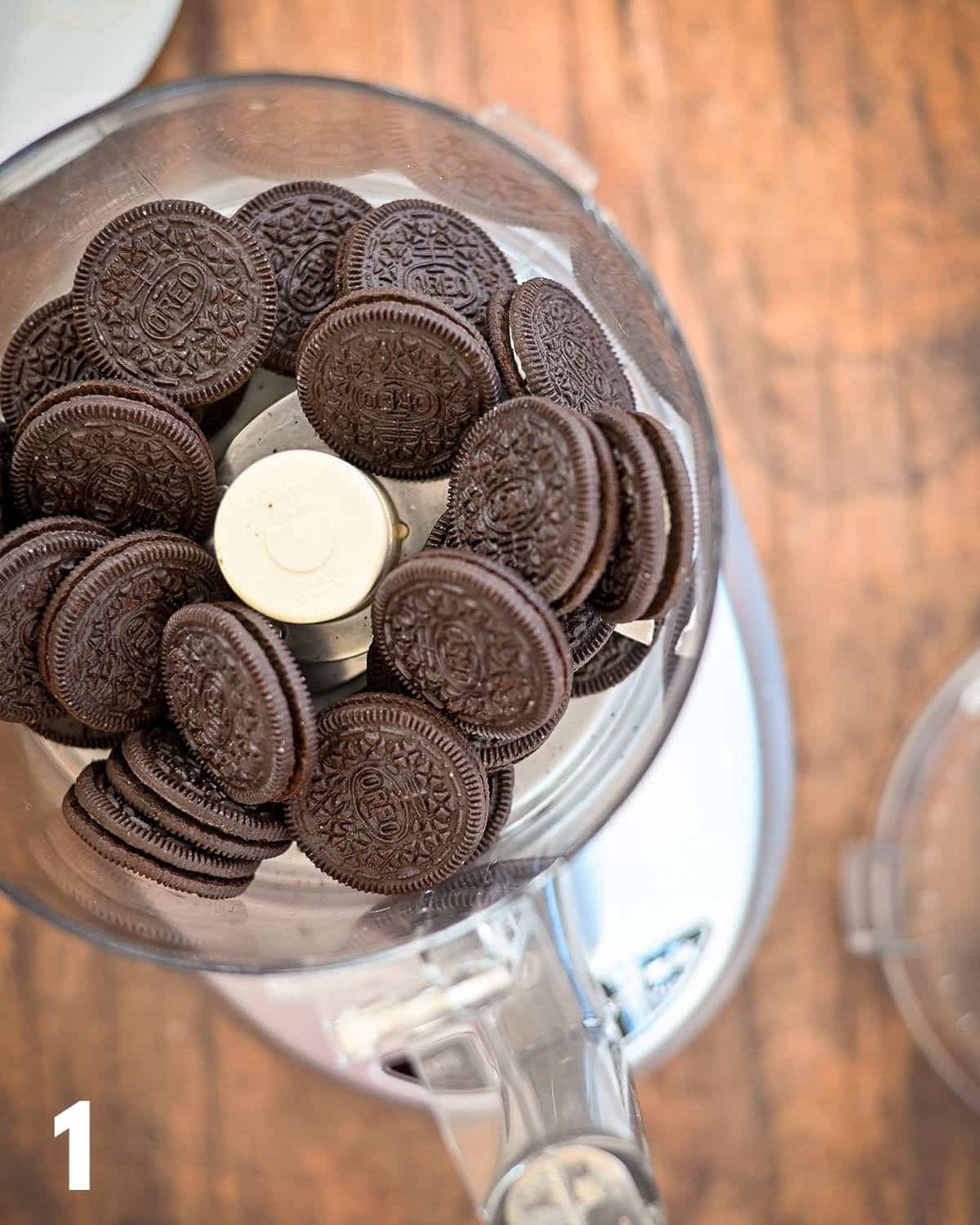 Oreo cookies in a food processor. 