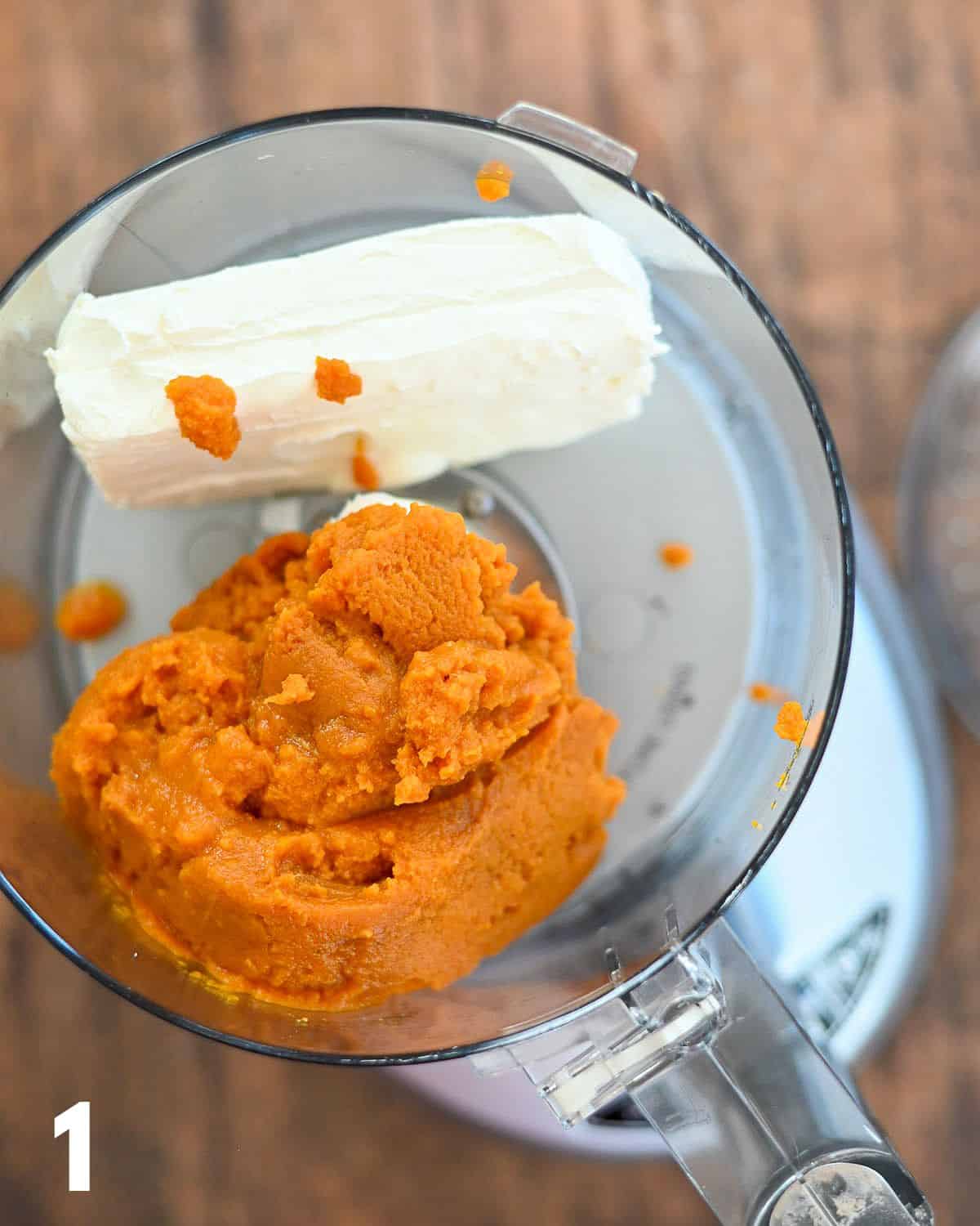 Canned pumpkin and cream cheese in a food processor. 