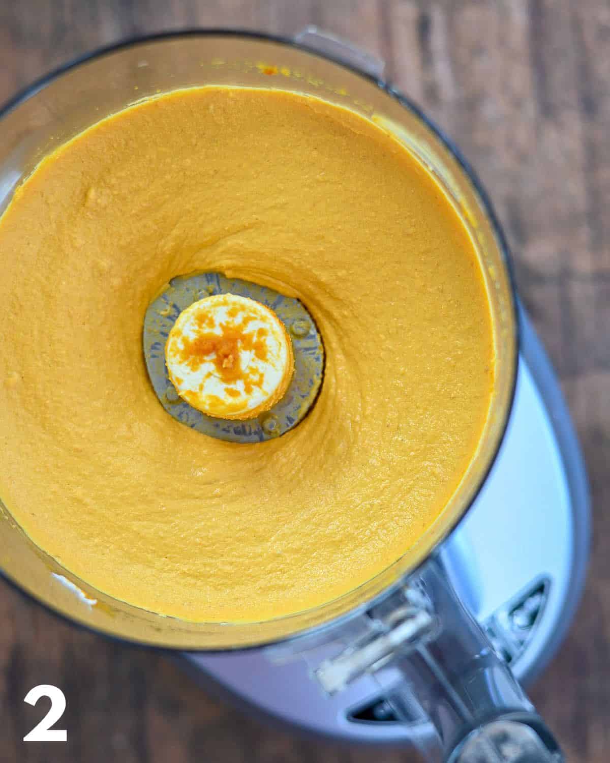 Whipped pumpkin and cream cheese in a food processor.