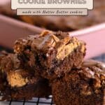 A stack of irresistible Nutter Butter Chocolate Chip Brownies sits on a cooling rack, with a baking pan in the background. These decadent treats combine classic peanut butter cookie brownies and the unmistakable crunch of nutter butter for the ultimate dessert experience.