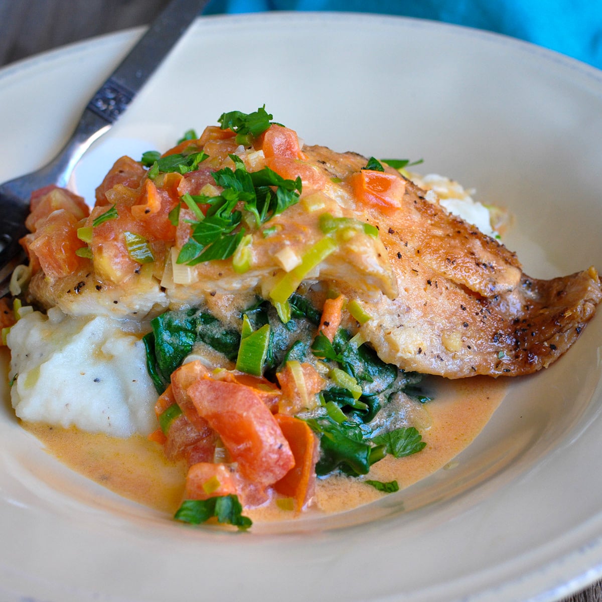 spinach and tomatoes over tilapia over mashed potatoes