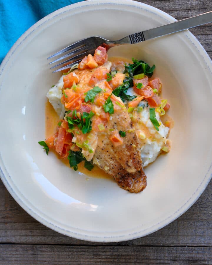 Tilapia with a Creamy Tomato Sauce - Cook This Again Mom