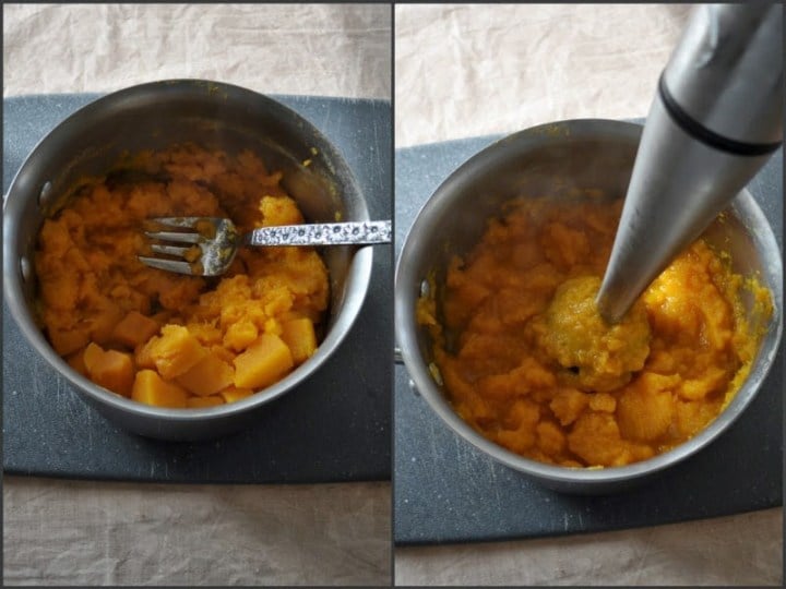 cooked butternut squash in a pan getting mashed