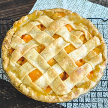close up photo of a fresh baked apricot pie