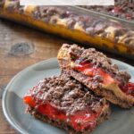 pinterest graphic with 2 chocolate cherry dessert pars on a plate