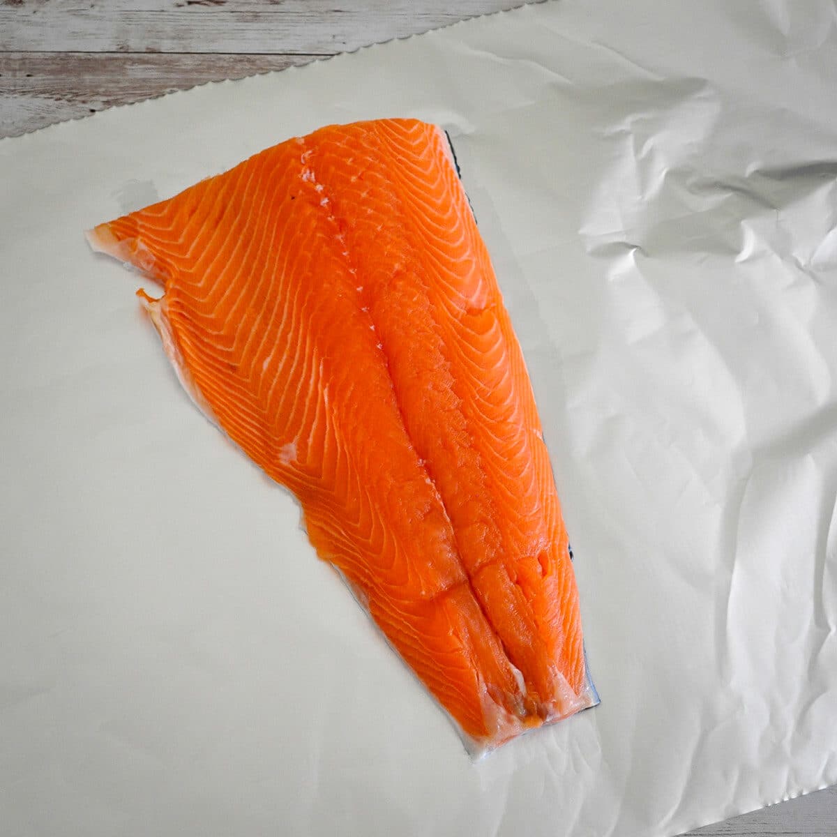 uncooked salmon on foil