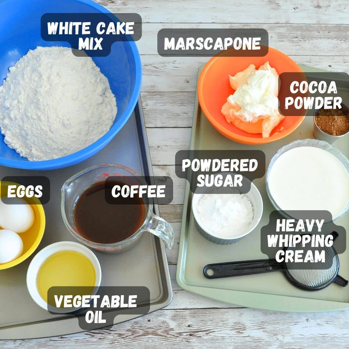 Ingredients for Tiramisu Cupcakes displayed on a table and labeled.