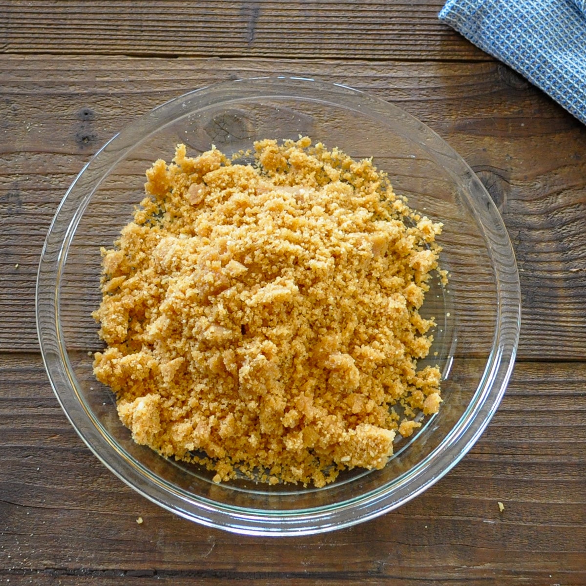 Vanilla Wafer pie crust ingredients in a pie plate.