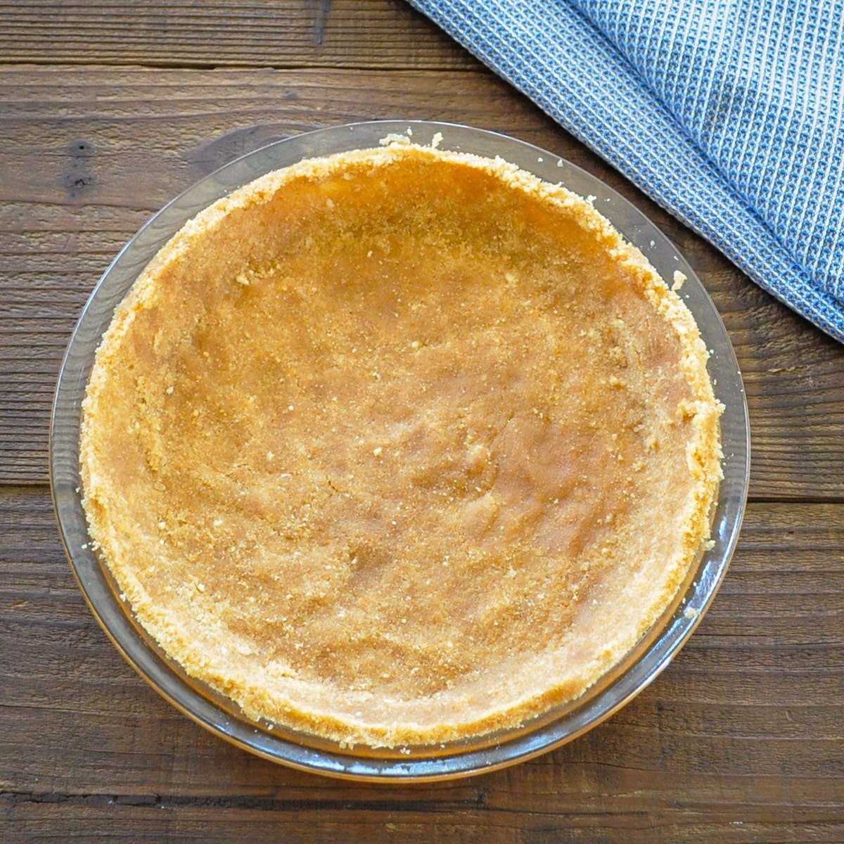 nilla wafer pie crust ingredients pressed into a pie plate
