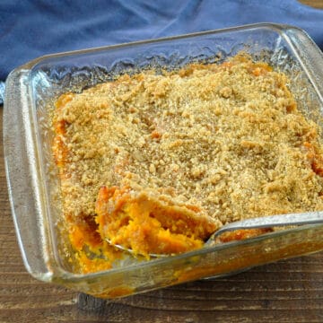 mashed sweet potatoes in a clear casserole dish