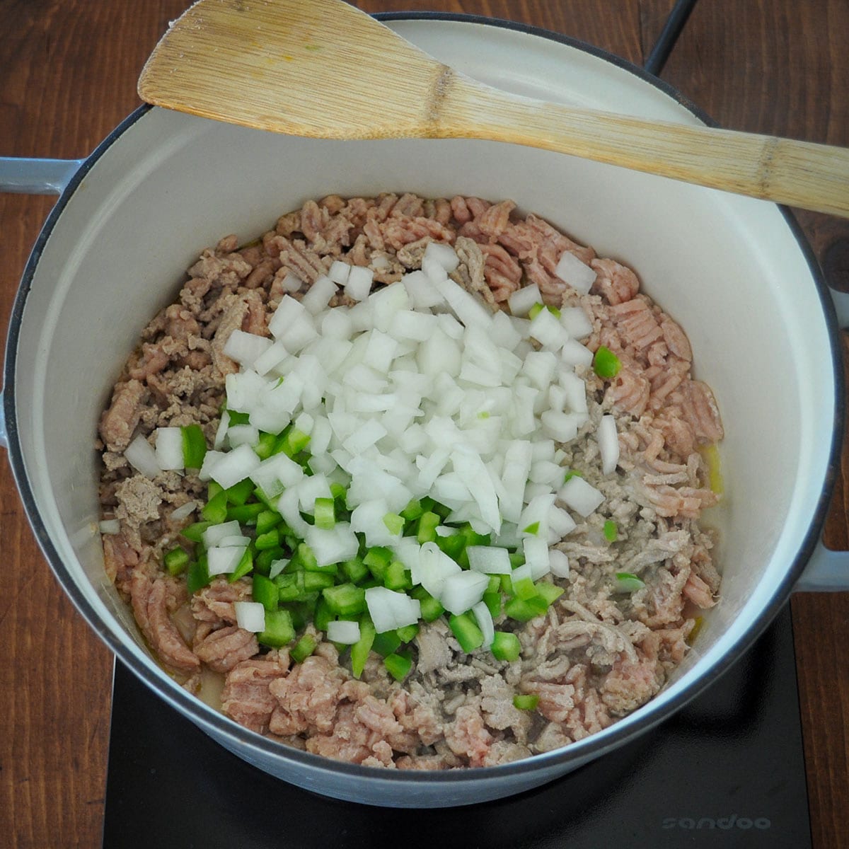 ground turkey, onion, and green bell pepper in a large pot