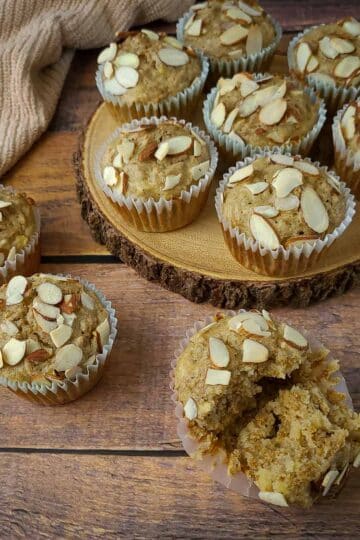 close up photo of muffins next to a beige towel