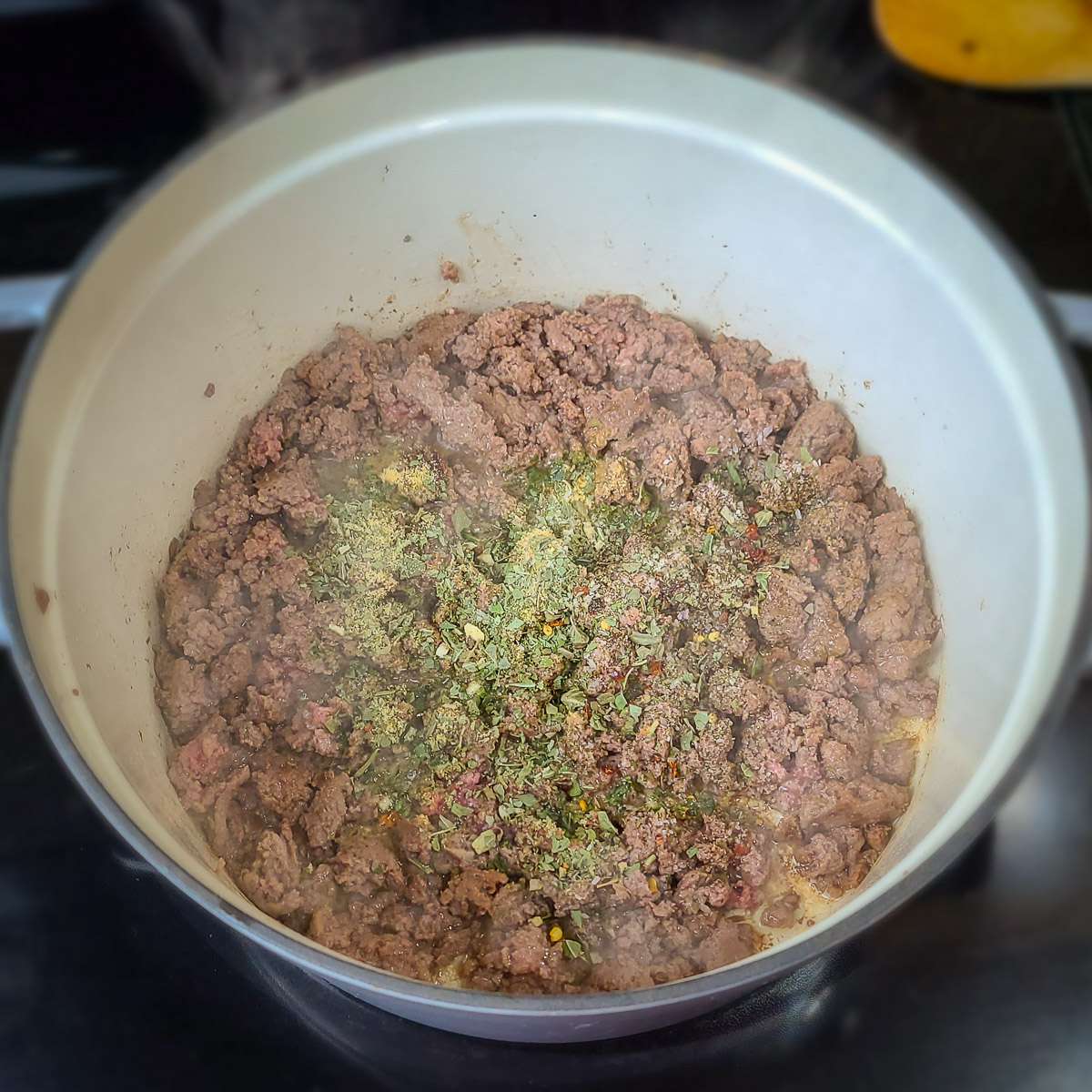 ground turkey with spices cooking in a large pot