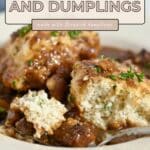 Beef and Dumplings stew served on a plate, topped with rich gravy and fresh herbs for a comforting meal.