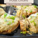 Cheesy pork chops in a skillet with melted cheese and green onions, a fork lifting one piece—these easy cheesy pork chops make the perfect quick dinner.
