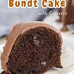 A slice of Chocolate Espresso Bundt Cake, draped in a rich espresso glaze, rests invitingly on a white plate.