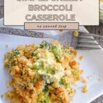 A serving of Simple Broccoli Casserole with a cheesy crumb topping sits on a white plate next to a fork, ready to enjoy.