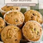 Zucchini Bread Muffins with applesauce and chocolate chips in paper liners, arranged on a cloth, with text describing this moist and delicious Zucchini Bread Muffins recipe.