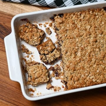 Raspberry Jam Oatmeal Bars in a white baking dish.