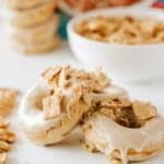 Cinnamon Toast Crunch Cereal Donuts stacked on a counter.
