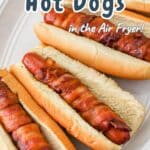 Sizzling bacon-wrapped hot dogs nestled in buns, perfectly crisped thanks to the air fryer. A culinary delight with an overlay of flavor and convenience that's simply irresistible.
