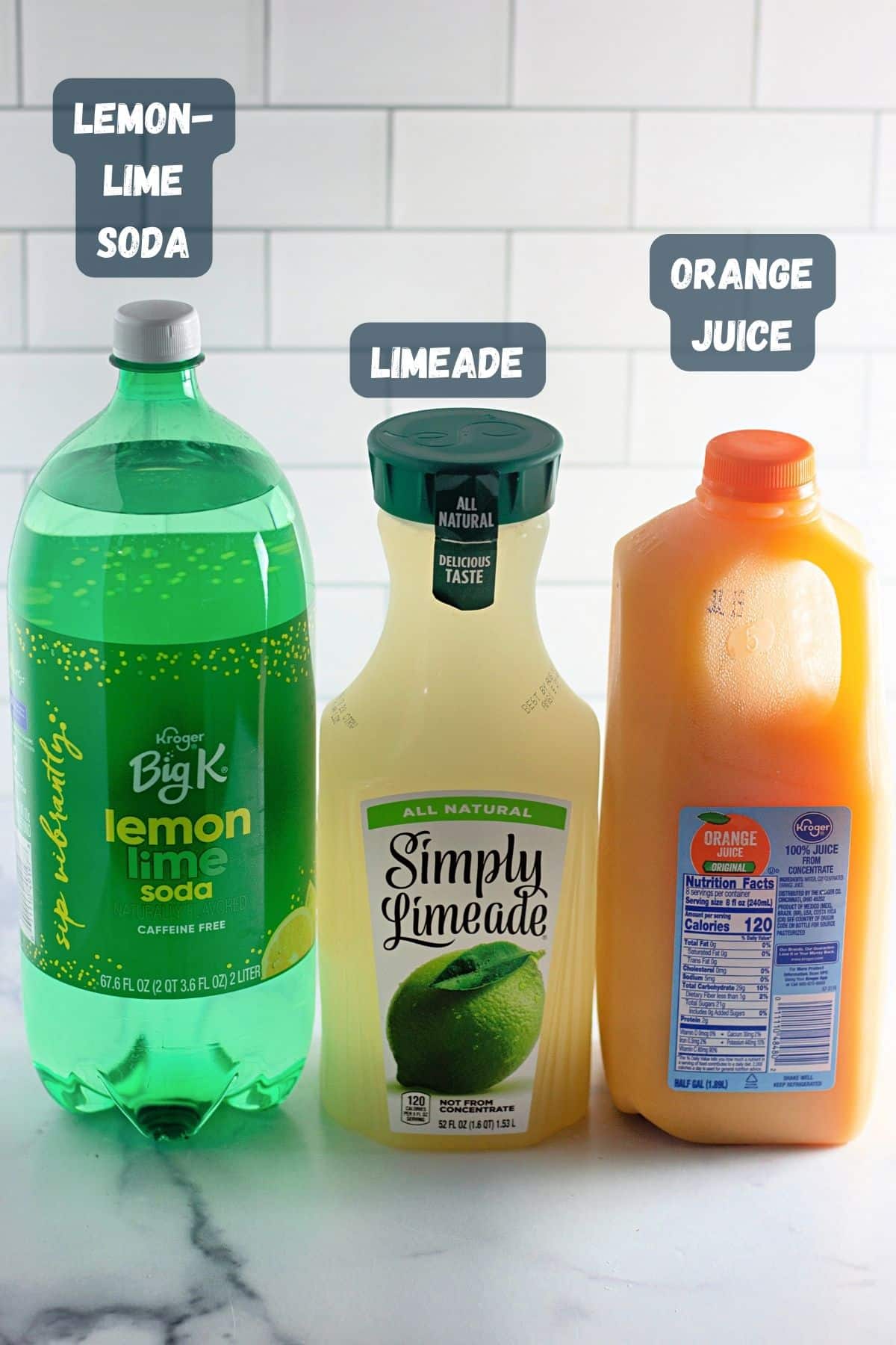 Ingredients shown and labeled to make virgin mimosas.