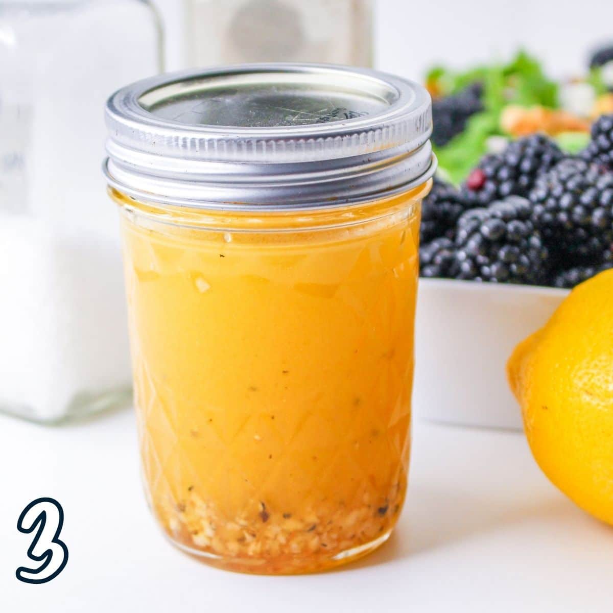 Mixed honey citrus dressing in a jar. 