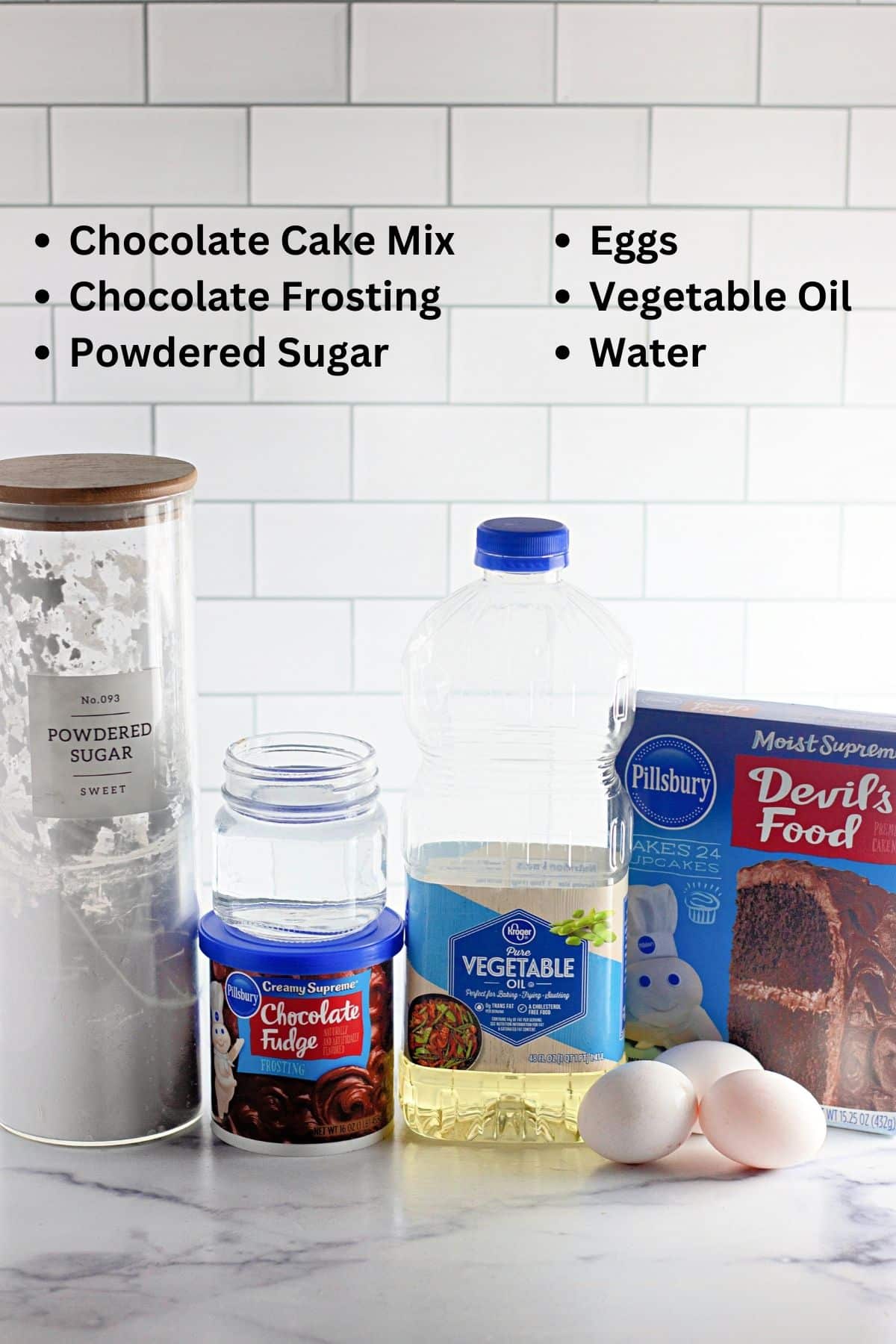 Ingredients shown to make microwave chocolate cake. 