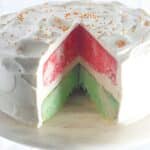 A cake with a slice taken out of it.