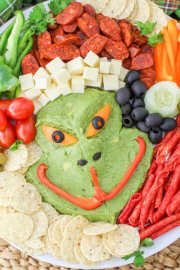 A plate with a grinch shaped dip on it.