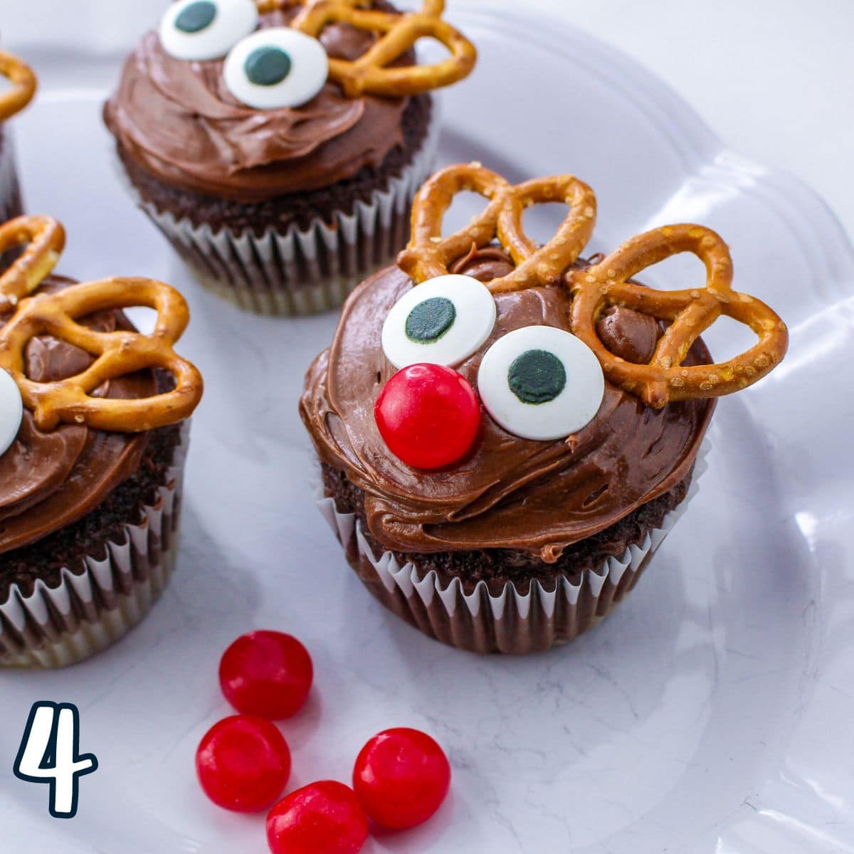 Reindeer cupcakes on a plate.