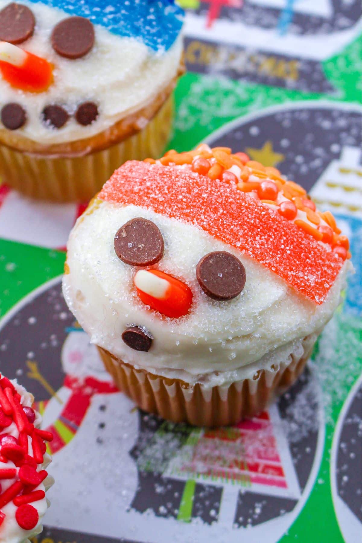 Snowman Cupcakes: Three adorable cupcakes meticulously decorated to resemble snowmen.