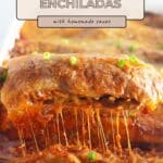 A cheesy beef enchilada is lifted from a baking dish, with melted cheese stretching in gooey strands—classic beef enchiladas perfection.