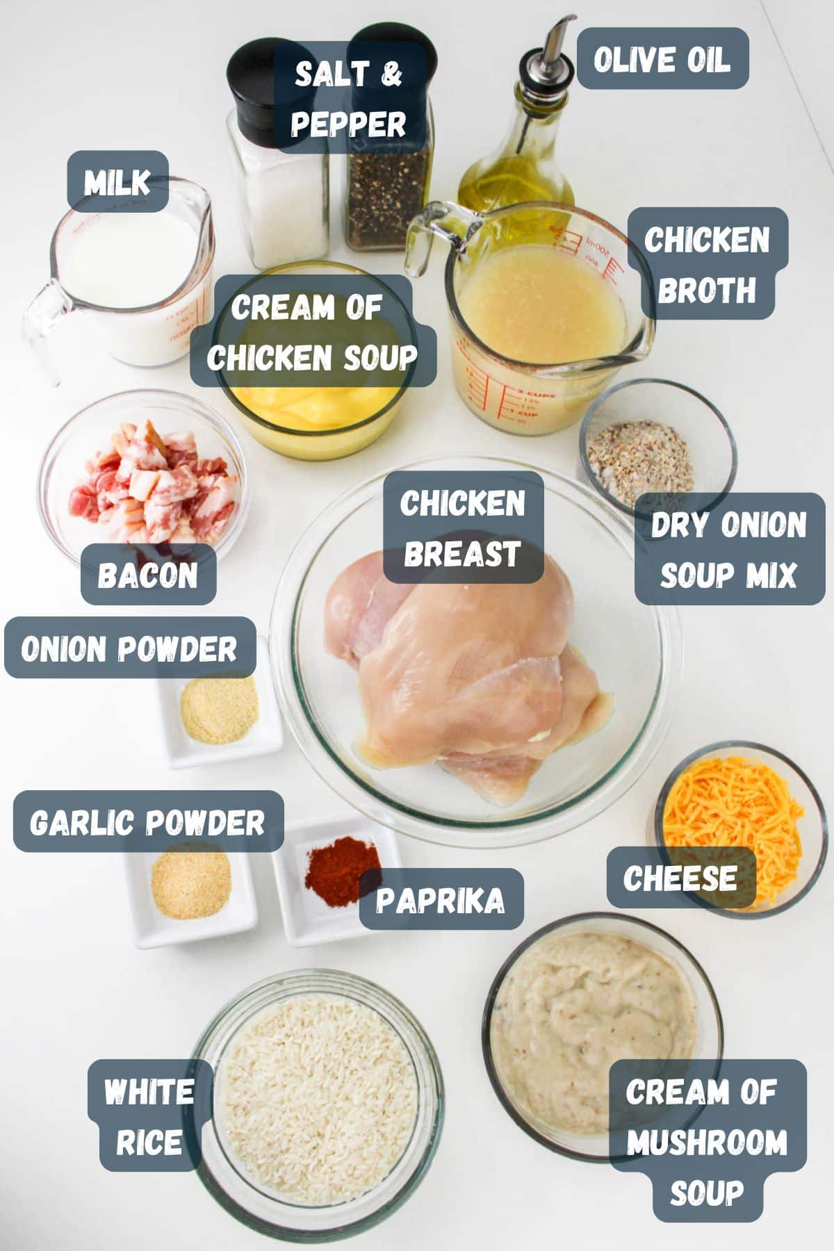 Ingredients for a recipe are laid out, including chicken breast, rice, cheese, and various seasonings and liquids.