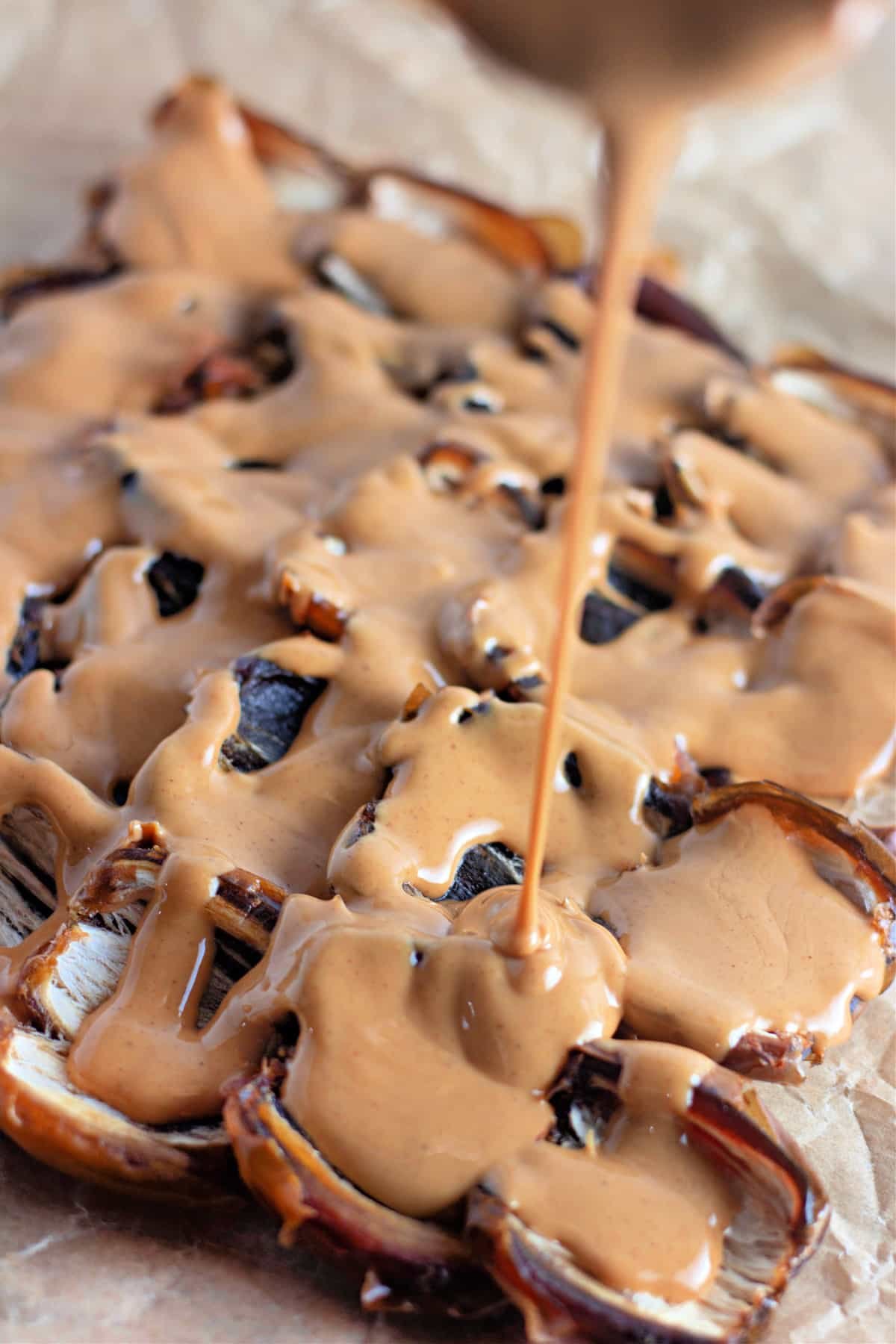 Date pieces drizzled with creamy peanut butter.