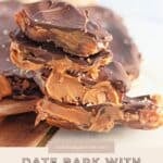 Stacked pieces of decadent date bark with peanut butter and chocolate sit on a wooden board.