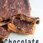 Chocolate bark with dates and peanut butter laying on a white backdrop with a graphics overlay for Pinterest.
